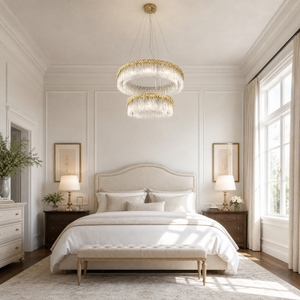 A double-tier chandelier with icicle-style textured crystal drops and a satin warm gold metal band.