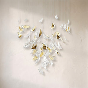 Floating Leaves chandelier, clear and gilded glass leaves suspended on fine cables in a cascade
