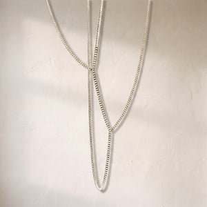 Gabriel gold crystal chandelier, slender crystal-set loops descending on fine cables