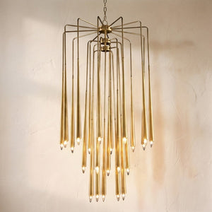 Hans twenty-three-light brass chandelier, tapered brass tubes in three graduated tiers