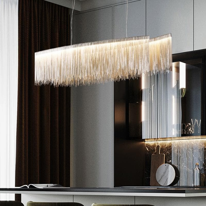 Linear fringe pendant above a counter, RHL Lighting