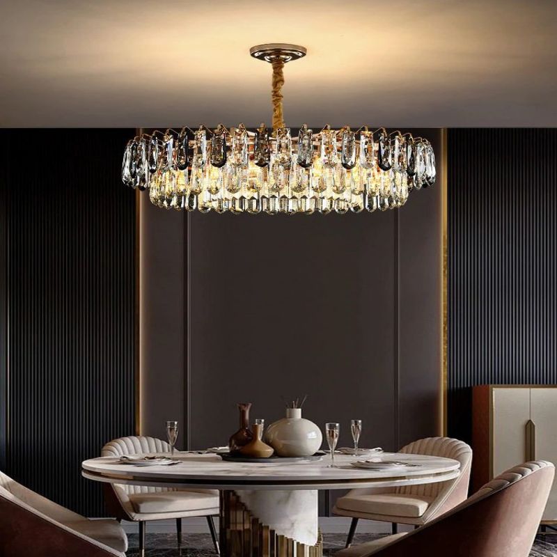 Crystal drum chandelier over a round dining table