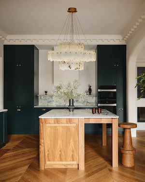 3-tiered stairwell chandeliers | irregular alabaster plate in disk ceiling with long cord, three-tier