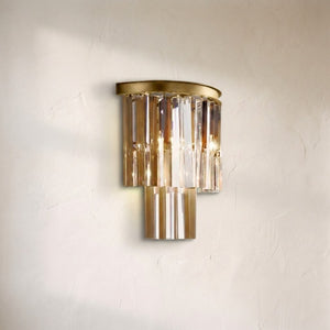 1920s Orion wall sconce, two tiers of amber and clear crystal prisms under a brushed brass cap