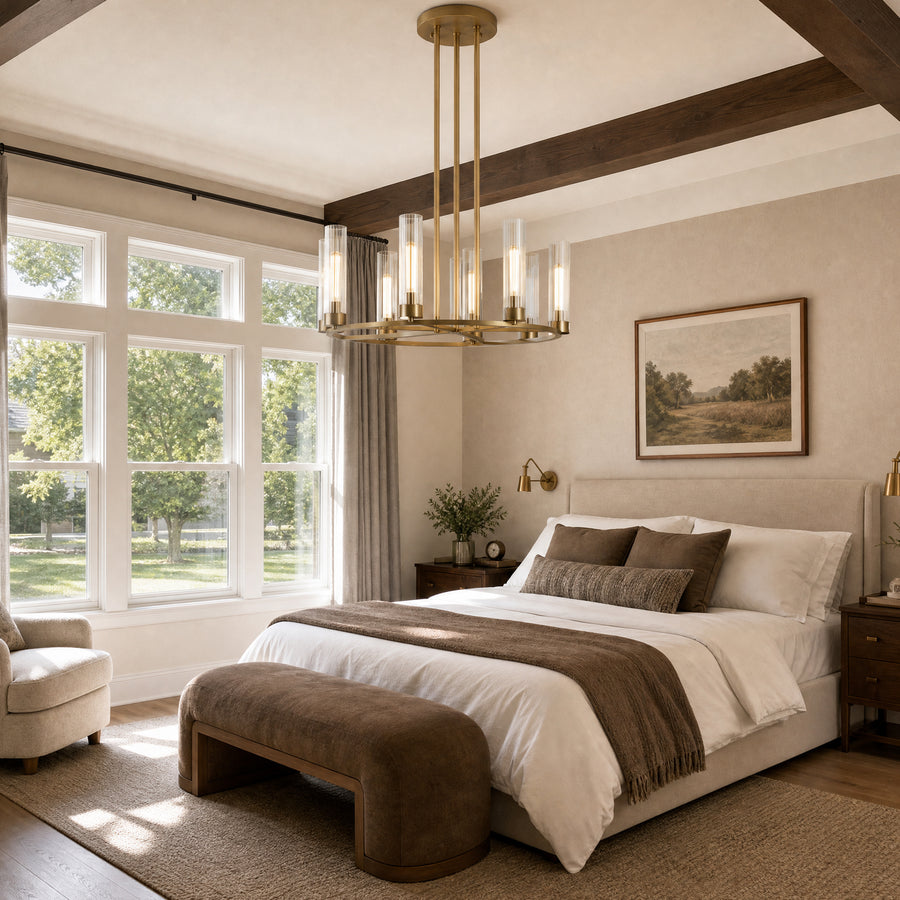 Beamed bedroom with an oval brass chandelier holding fluted glass shades