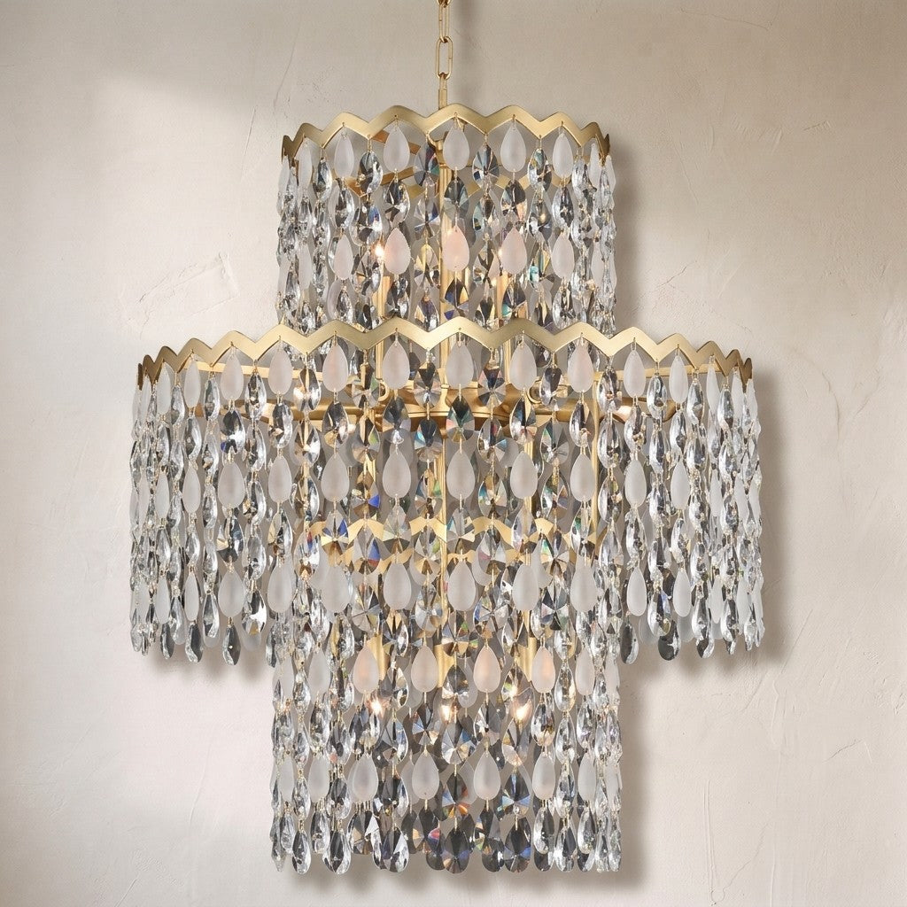 Caretta drum chandelier, three tiers of clear and frosted crystal teardrops under zigzag brass rims