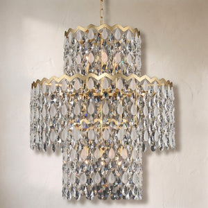 Caretta drum chandelier, three tiers of clear and frosted crystal teardrops under zigzag brass rims