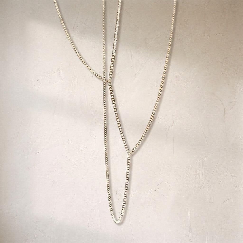 Gabriel chrome crystal chandelier, slender crystal-set loops descending on fine cables