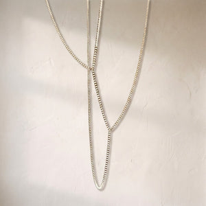 Gabriel chrome crystal chandelier, slender crystal-set loops descending on fine cables