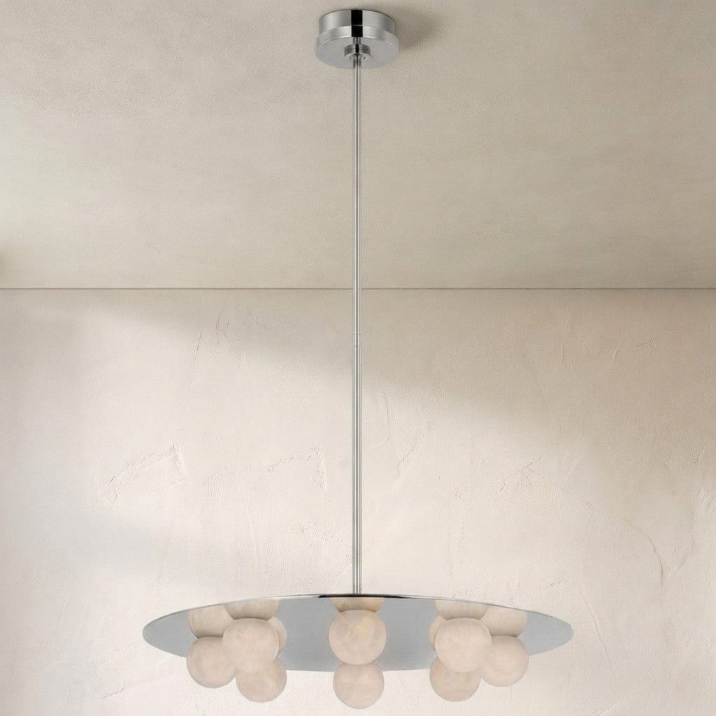 A modern circular pendant light fixture with a chrome metal frame and multiple frosted glass globe shades, suspended from a matching ceiling canopy against a textured off-white wall.