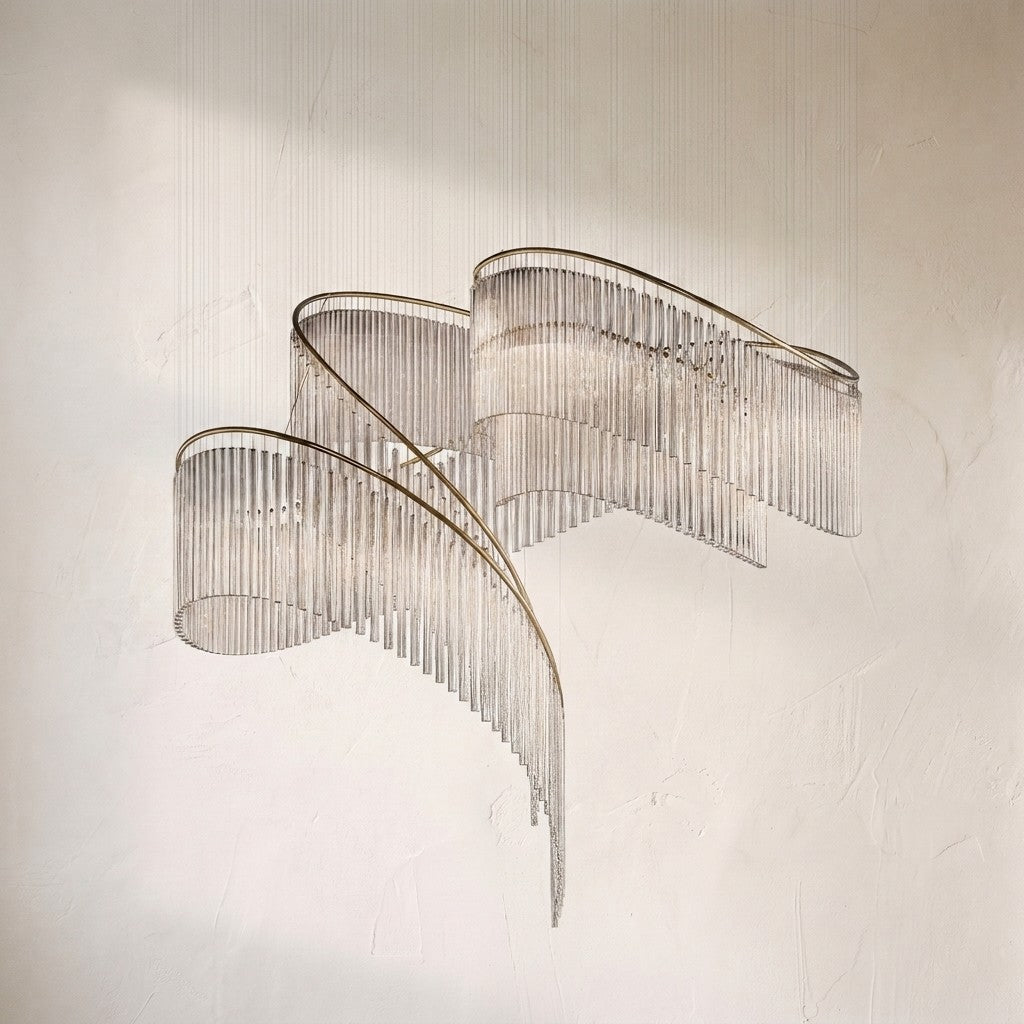 Rivella cascade fringe chandelier, curtain of clear glass rods sweeping around a brass rail