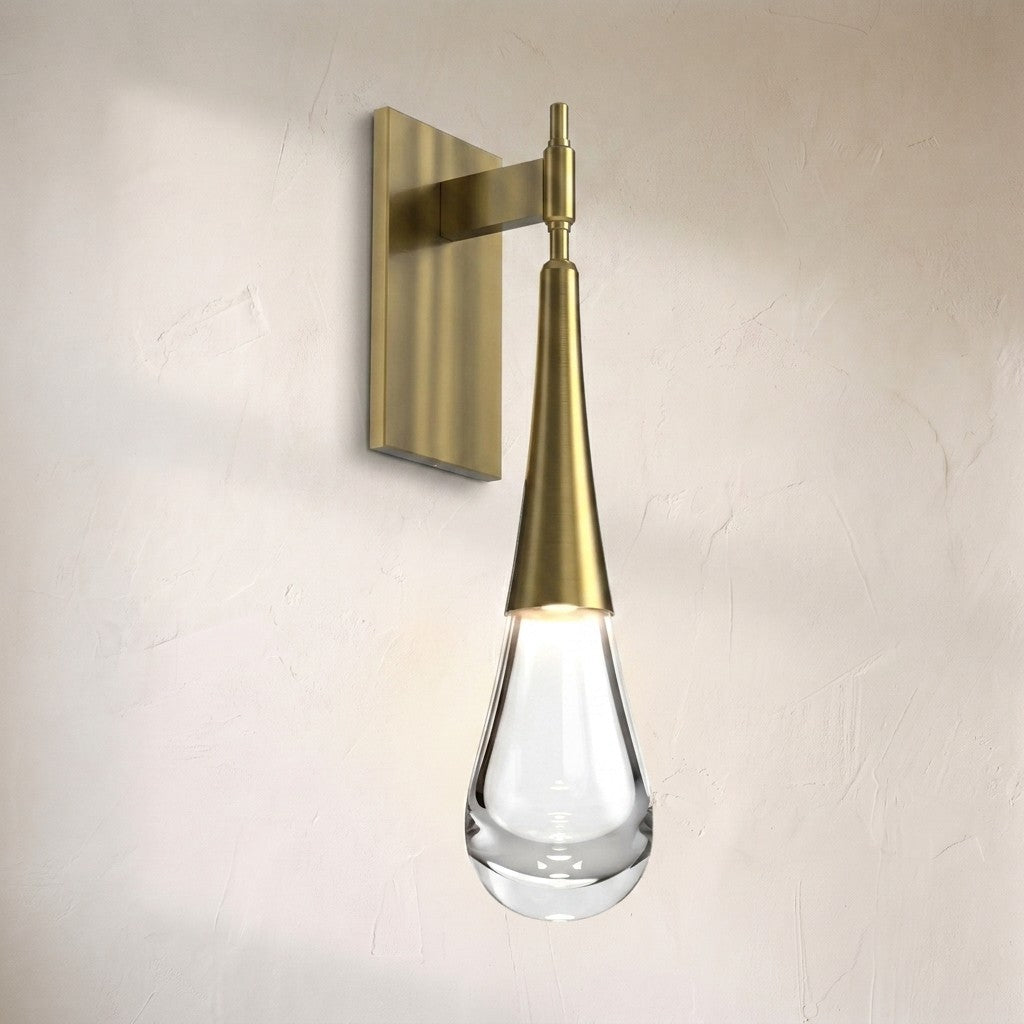 Water Drop LED wall sconce, tapered brass stem ending in a clear teardrop glass diffuser